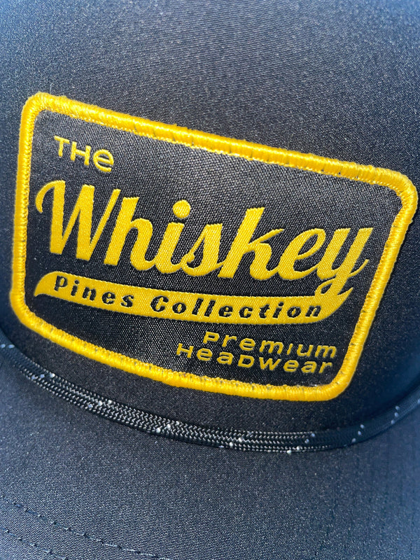 Black "Whiskey Pines Co." Trucker Rope Hat